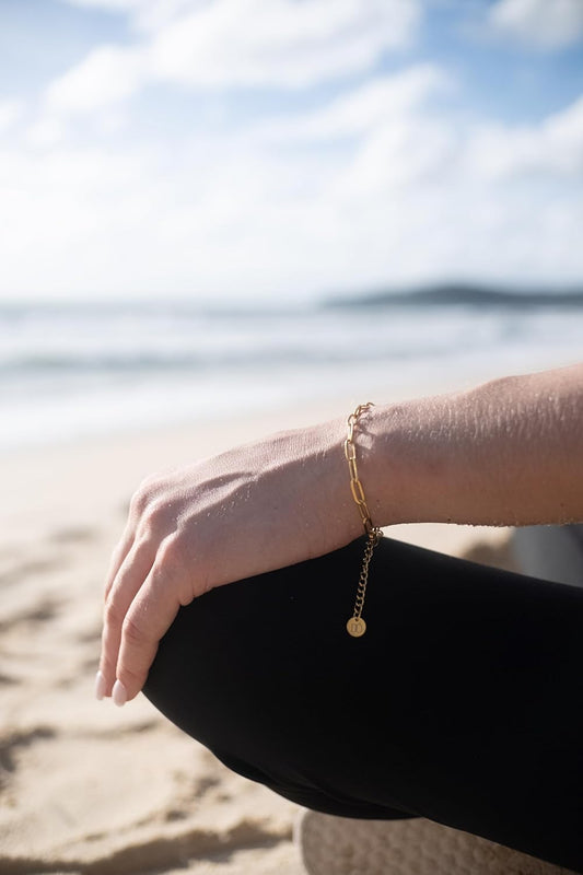 18k gold waterproof paperclip bracelet on wrist