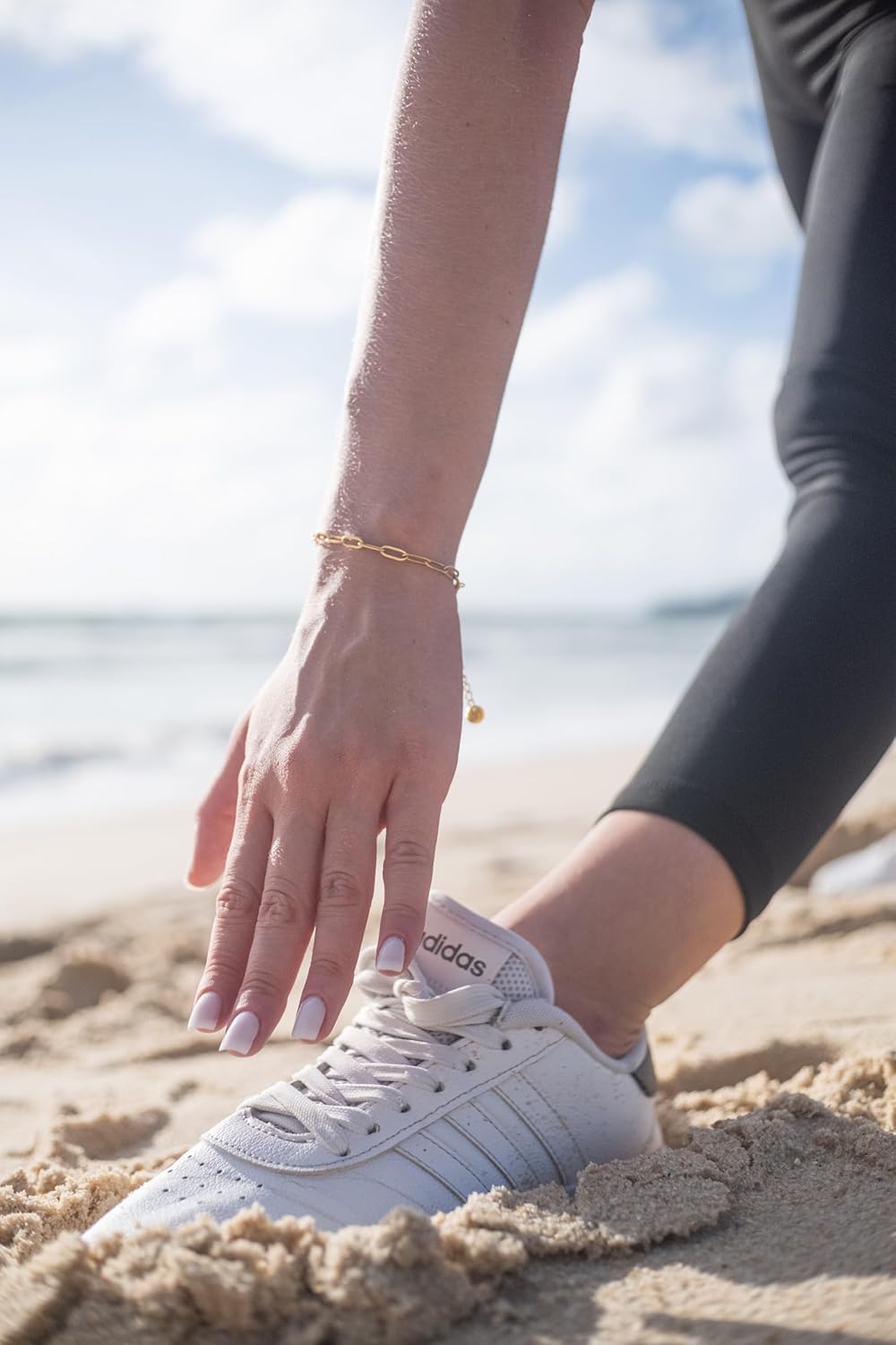 Gold paperclip bracelet with extender chain