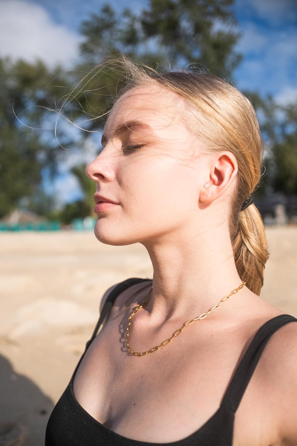 18k gold waterproof paperclip necklace on model